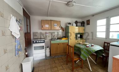 casa con local comercial