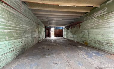 casa con local comercial