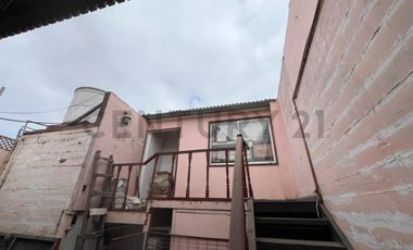 casa con local comercial