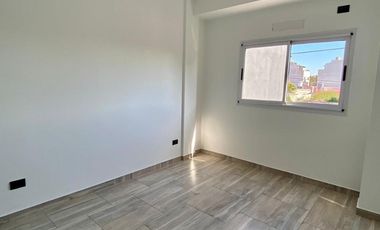 DEPARTAMENTO 2 AMBIENTES AL FRENTE A ESTRENAR CON BALCÓN Y COCHERA. EDIFICIO CON GIMNASIO, TERRAZA Y PARRILLA