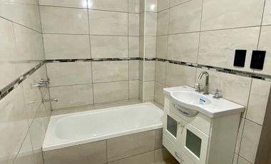DEPARTAMENTO 2 AMBIENTES AL FRENTE A ESTRENAR CON BALCÓN Y COCHERA. EDIFICIO CON GIMNASIO, TERRAZA Y PARRILLA