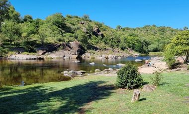 EXCELENTE PREDIO EN VENTA, DE 2.100 MT2 CON FONDO AL RIO BALNEARIO TALAHUASI, IDEAL PARA COMPLEJO