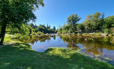 EXCELENTE PREDIO EN VENTA, DE 2.100 MT2 CON FONDO AL RIO BALNEARIO TALAHUASI, IDEAL PARA COMPLEJO