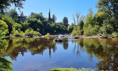 EXCELENTE PREDIO EN VENTA, DE 2.100 MT2 CON FONDO AL RIO BALNEARIO TALAHUASI, IDEAL PARA COMPLEJO