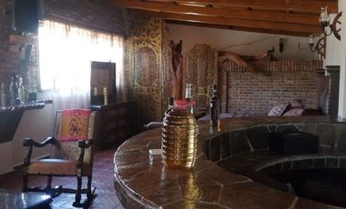 Rancho con caballerizas