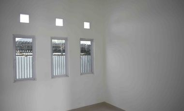 PERUMAHAN CLUSTER PINGGIR JALAN DELIMA