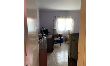 casa dos dormitorios y quincho sobre terreno de 400m2