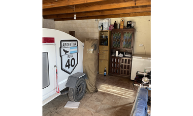 casa dos dormitorios y quincho sobre terreno de 400m2