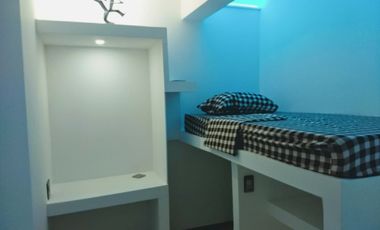 Habitación amueblada