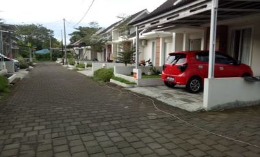 RUMAH TERMURAH TEPI JALAN UTAMA DEKAT BANDARA SAMRATULANGI