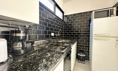 Departamento de un dormitorio reciclado con terraza exclusiva
