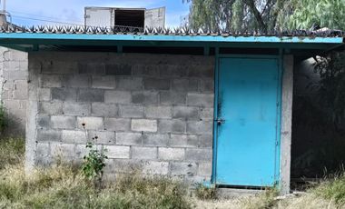 Terreno con bodega en venta
