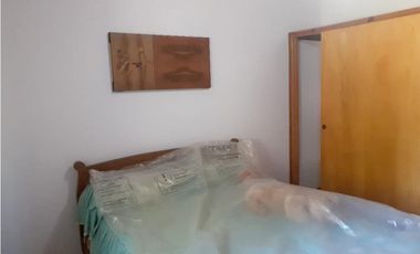 Chalet 3 ambientes con quincho ubicado sobre dos lotes/ El Tejado
