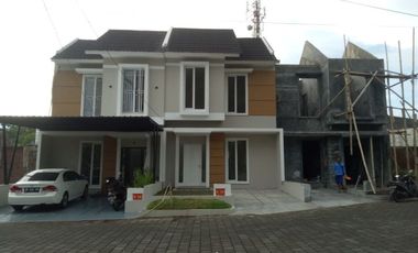 RUMAH CANTIK 2 LT TERMURAH DEKAT BANDARA SAMRATULANGI