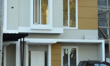 RUMAH CANTIK 2 LT TERMURAH DEKAT BANDARA SAMRATULANGI