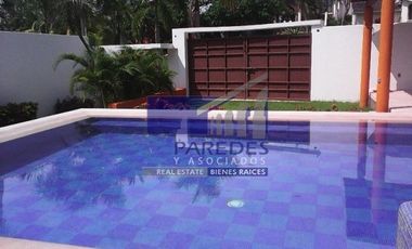 A14 Casa  4 recamaras frente a Campo de Golf  Ixtapa