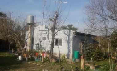 VENTA DE 7  LOTES CON 2 VIVIENDAS  EN DOMSELAAR