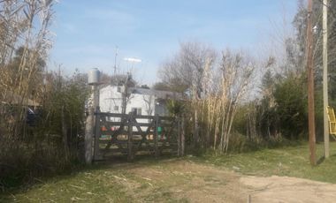 VENTA DE 7  LOTES CON 2 VIVIENDAS  EN DOMSELAAR