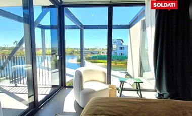 Venta Casa  6 ambientes  Puertos del Lago, a la laguna con muelle y Pileta