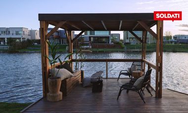 Venta Casa  6 ambientes  Puertos del Lago, a la laguna con muelle y Pileta