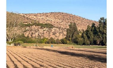 TERRENO AV EL GUANACO HUECHURABA