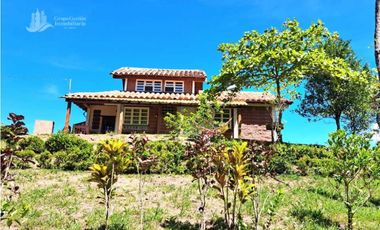 VENDO CASA Y UNA HECTAREA EN GUALACA