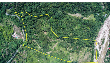 TERRENO CON SALIDA AL RIO CUMBAZA Y CARRETERA