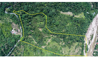 TERRENO CON SALIDA AL RIO CUMBAZA Y CARRETERA