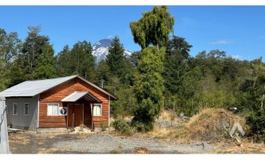Parcela con casa y cabañas en venta en Villarrica