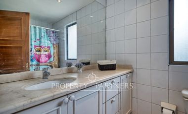 Casa Chilena en Batuco, condominio con agua