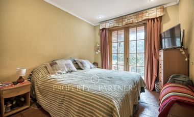 Casa Chilena en Batuco, condominio con agua