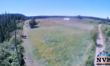 Terreno de 12.500 mts2 con cabaña en construcción se vende