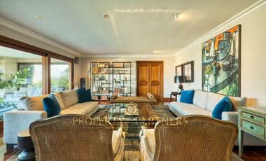 Espectacular departamento con vista panorámica a Santiago, jardín y piscina privada