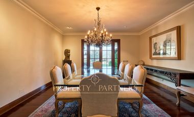 Espectacular departamento con vista panorámica a Santiago, jardín y piscina privada