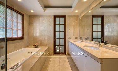 Espectacular departamento con vista panorámica a Santiago, jardín y piscina privada