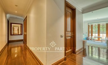 Espectacular departamento con vista panorámica a Santiago, jardín y piscina privada