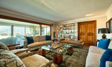 Espectacular departamento con vista panorámica a Santiago, jardín y piscina privada