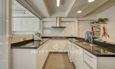Espectacular departamento con vista panorámica a Santiago, jardín y piscina privada