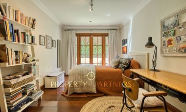 Espectacular departamento con vista panorámica a Santiago, jardín y piscina privada