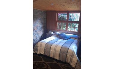 VENDO CASA ESTILO CABAÑA EN COTA(GU)