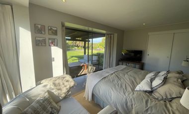 Acogedora casa sólida con amplio jardín en Las Brisas de Santo Domingo