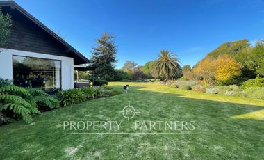 Acogedora casa sólida con amplio jardín en Las Brisas de Santo Domingo