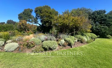 Acogedora casa sólida con amplio jardín en Las Brisas de Santo Domingo