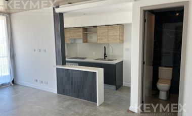 Departamento 2 ambientes, balcón corrido con parrilla y vista abierta.