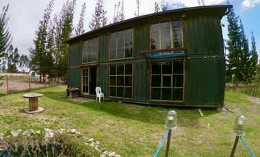 VENTA O CANJE de terreno y casa container. Malchinguí