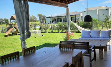 El Cantón . Golf | Alquiler temporario | Muy linda casa con vista al golf
