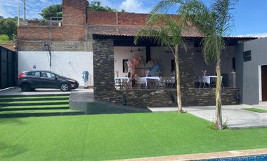 Terraza de eventos con alberca