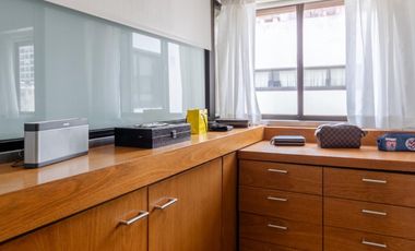 Departamento en el barrio La Imprenta con dormitorio en suite