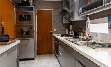 Departamento en el barrio La Imprenta con dormitorio en suite