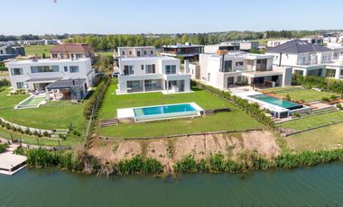 Casa a la laguna en Pilara - La Calesa Orientacion NO | Mallmann Propiedades